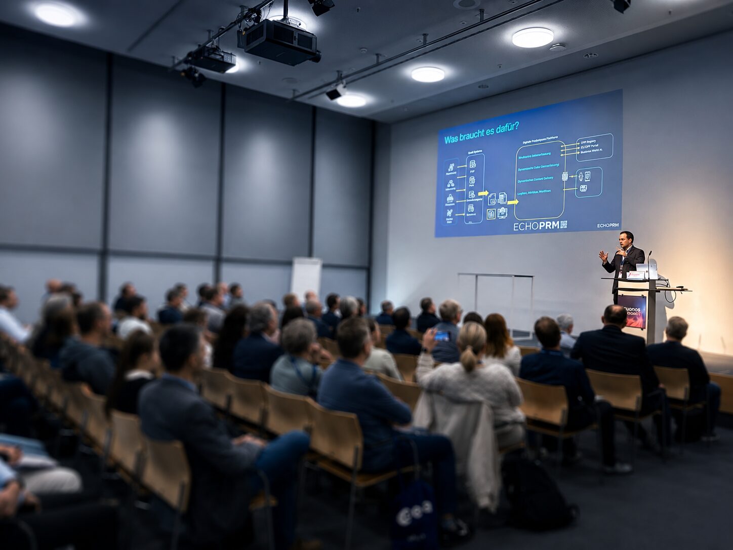 Full audience watching an ECHO PRM Digital Product Passport keynote at Quanos Connect